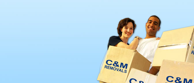 Man and woman with house relocation removal boes